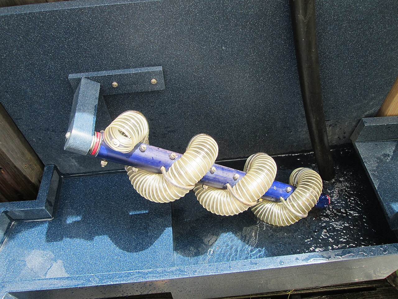 An Archimedean screw water exhibit at Long Island Children’s Museum