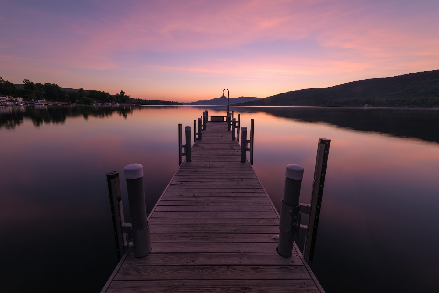 Lake George at dawn with mountains along the shore