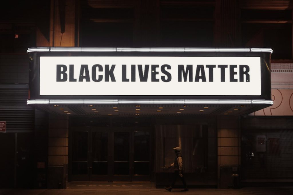 An archival Apollo marquee displaying Black Lives Matter