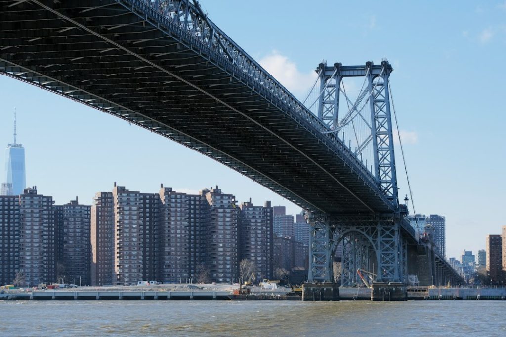 The underside of Williamsburg Bridge above the East River