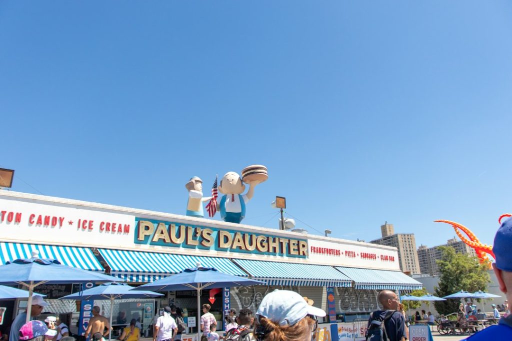 Colorful food stands along the Coney Island boardwalk