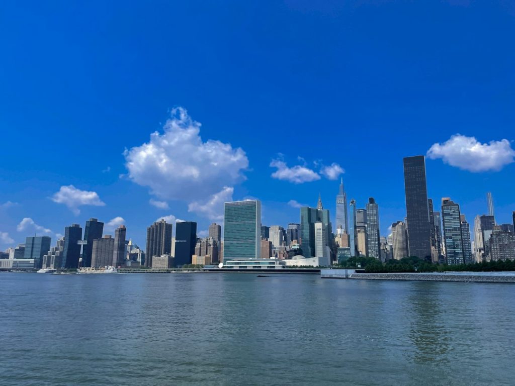 Manhattan buildings and the United Nations seen across the East River