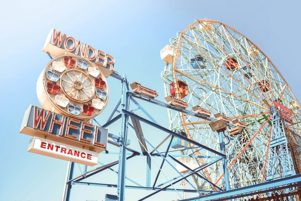 The Wonder Wheel and its entrance sign at Coney Island