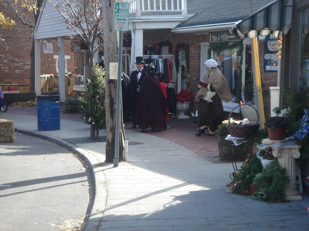 Costumed participants on a Port Jefferson street during an earlier Dickens Festival