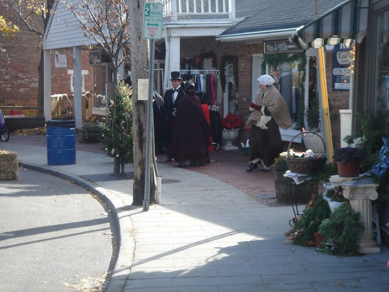 Costumed participants on a Port Jefferson street during an earlier Dickens Festival