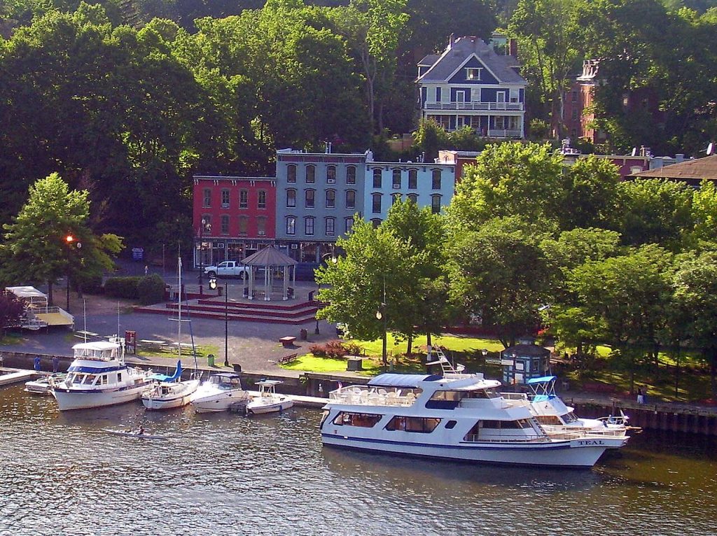 Historic buildings and boats beside Rondout Creek in Kingston, New York
