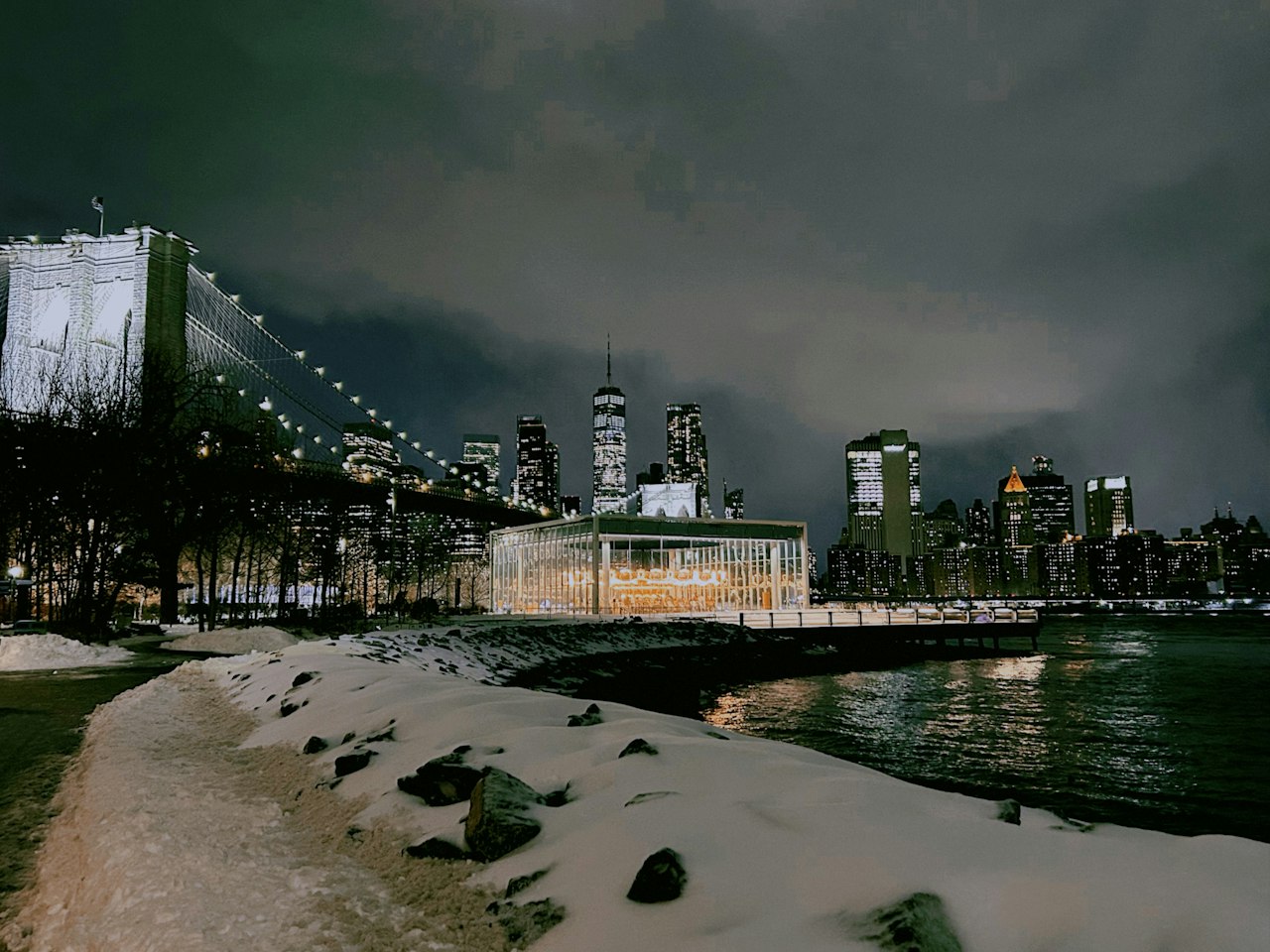 Brooklyn Bridge and the snowy Brooklyn waterfront