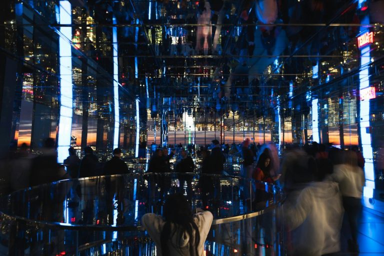 Visitors in a mirrored interior at SUMMIT One Vanderbilt