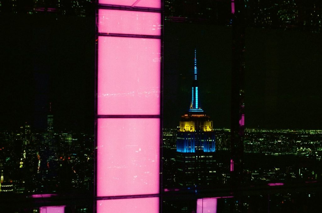 Empire State Building lights viewed from another high-rise